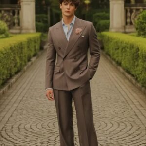 Relaxed-fit double-breasted brown pinstripe suit with a light blue dress shirt and patent leather loafers.